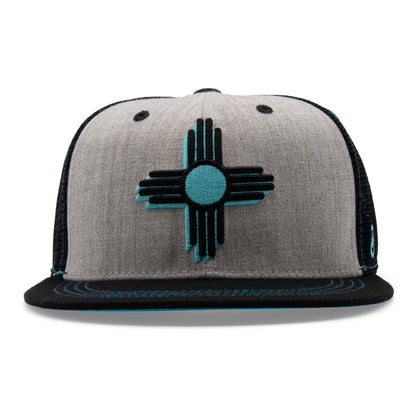 Front view of a heather gray New Mexico Zia cap with a black flat bill and an embroidered black and turquoise Zia sun symbol.